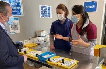 Speaking with the vaccination pharmacists at Tithe Farm site 